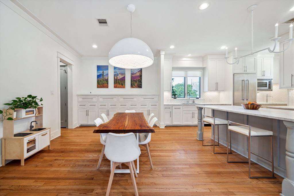 View toward the dining room with built ins and open to the gourmet kitchen