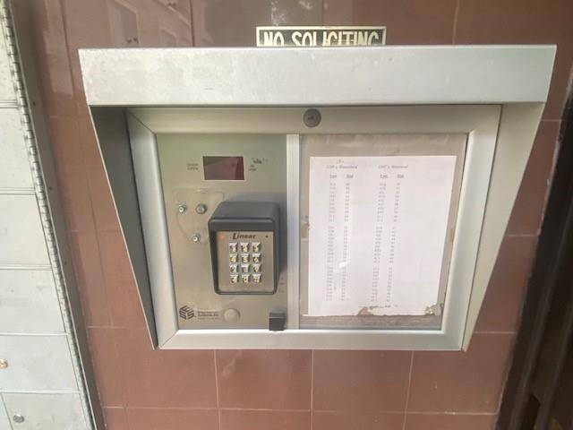 This is keypad to enter code to enter building 2209 S Braeswood.