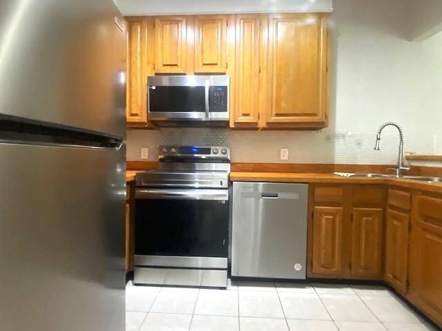 Cozy kitchen with fridge included.
