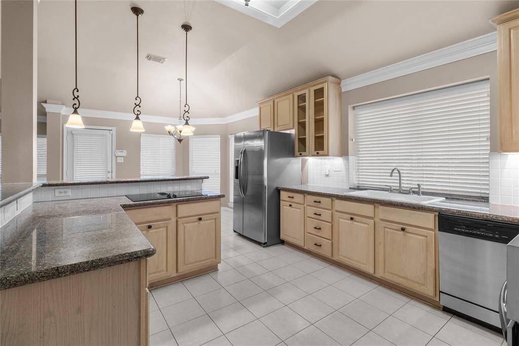 Spacious kitchen, granite counters and plenty of counter space.