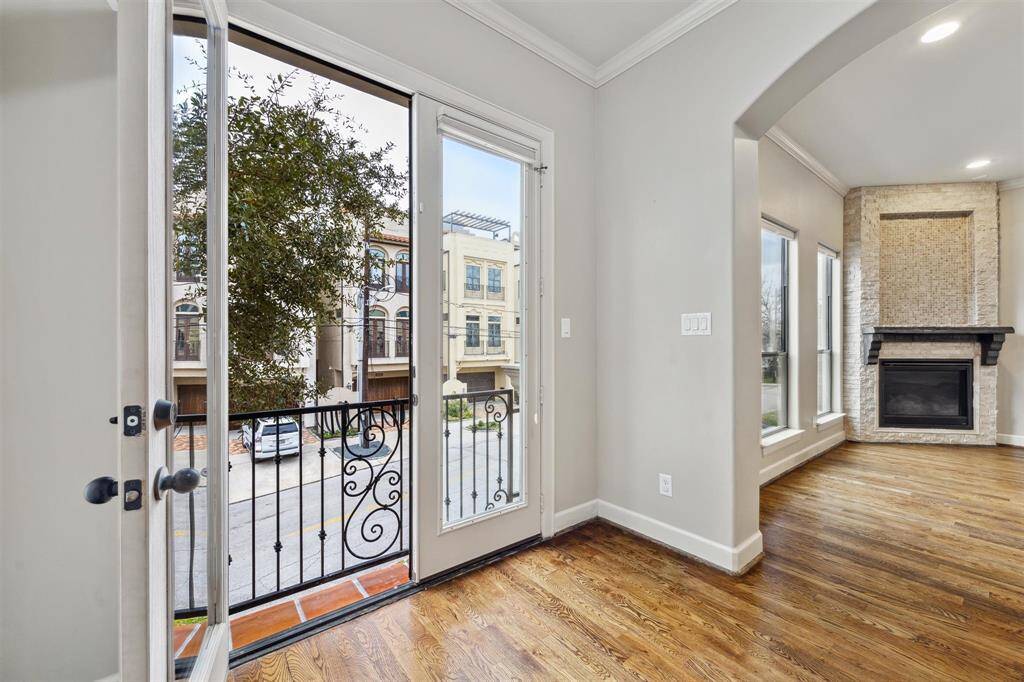 Juliet balcony just off the family room, allowing tons of natural light to flood the space, creating a bright and airy atmosphere.