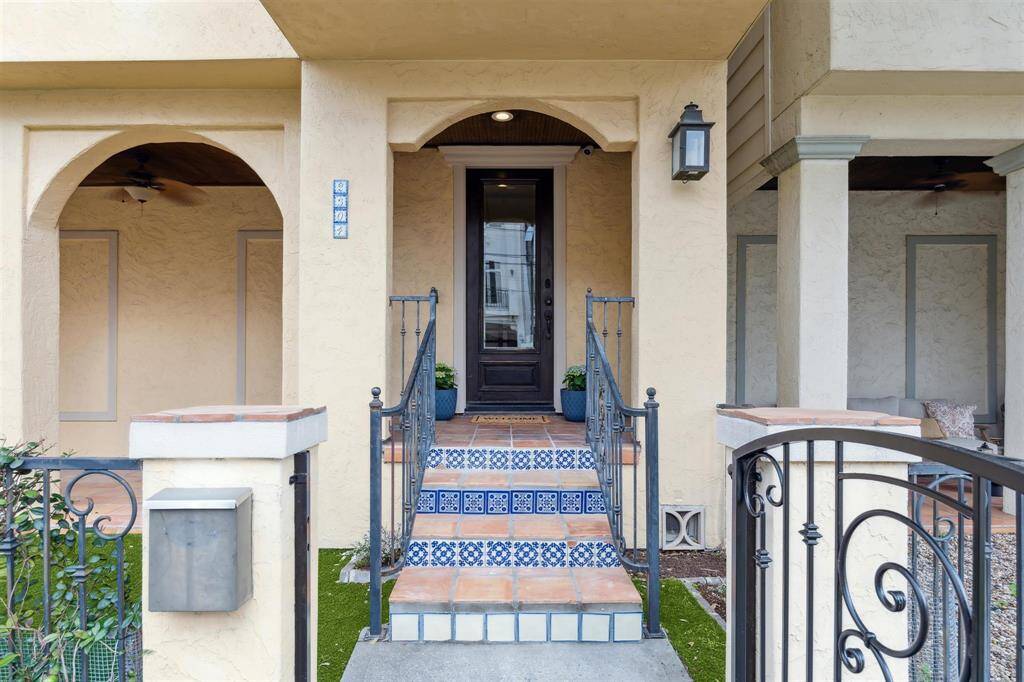 Welcoming entrance with blue Talavera and Saltillo tiled stairs, adding a touch of charm as you approach the front door.