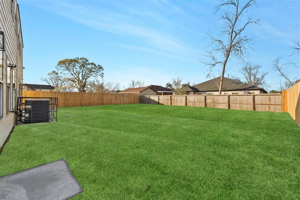 Driving fence is built, splitting the backyards