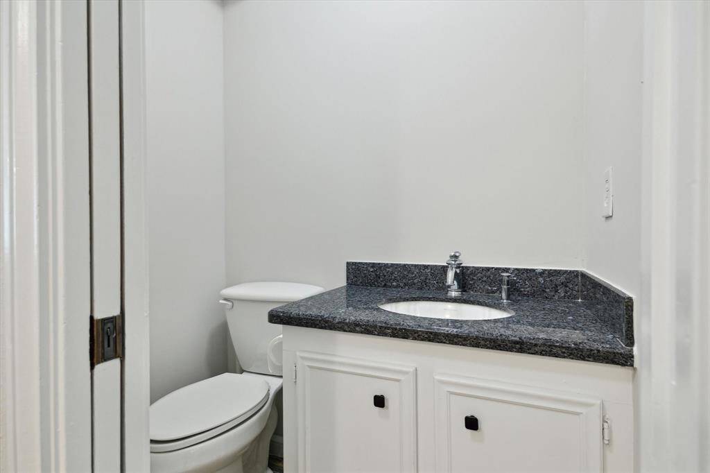 1/2 bath across from the laundry room.  Easy access to the backyard.