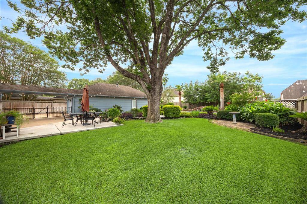 Large lot offers green space for the kids or pets