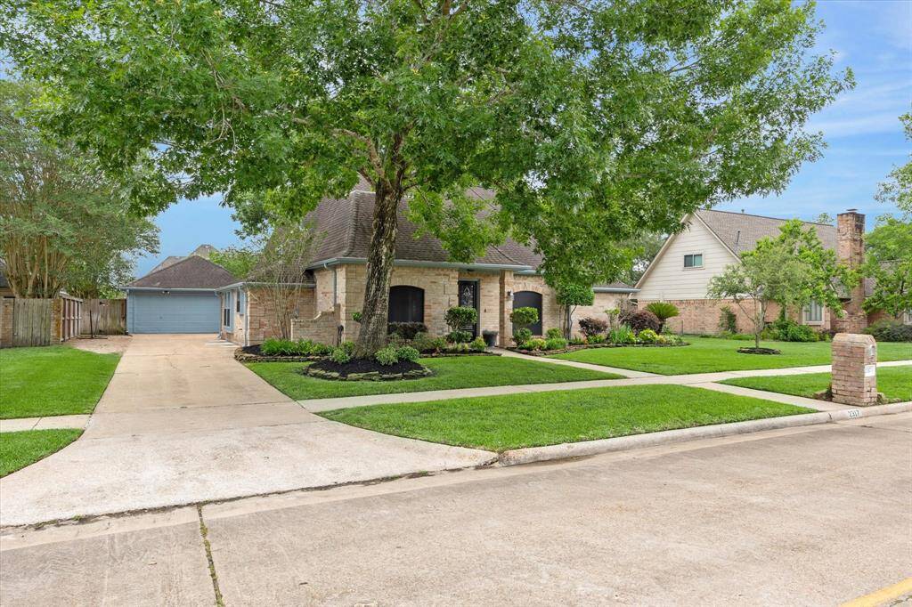 Detached garage in the back includes work area