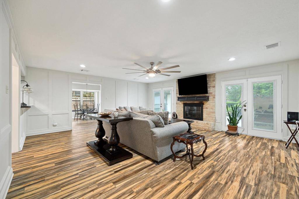 French doors in living room lead to the backyard