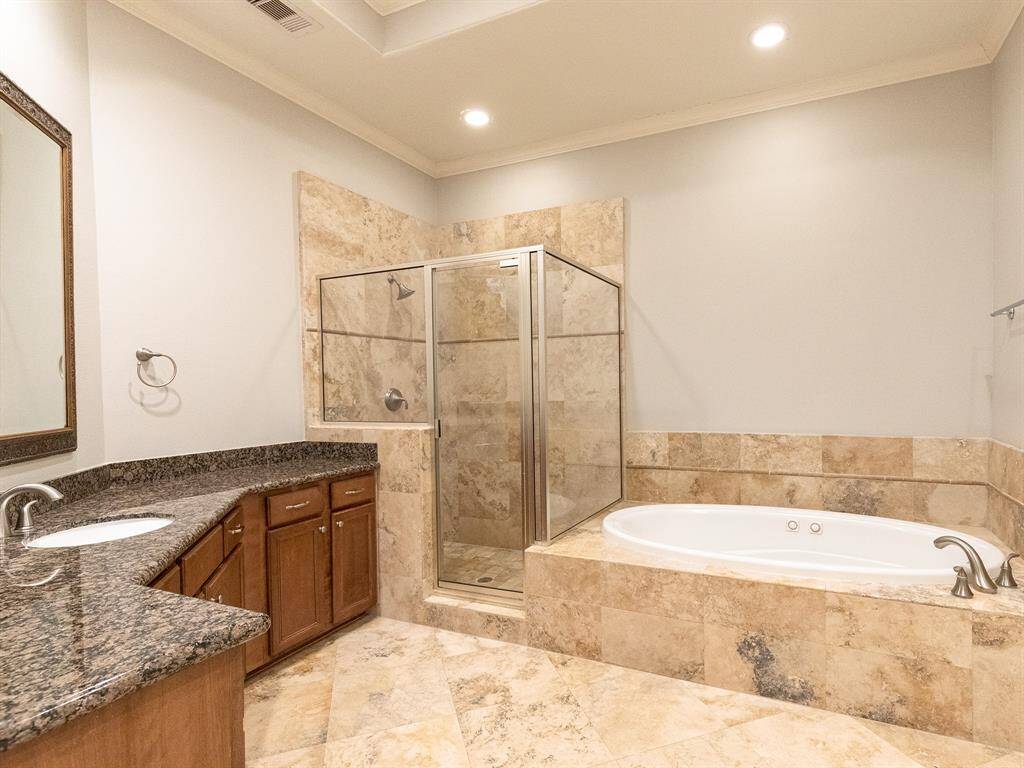 Primary Suite Bath with Jetted Spa and dual vanities