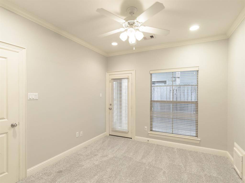bedroom 3 with access to back yard