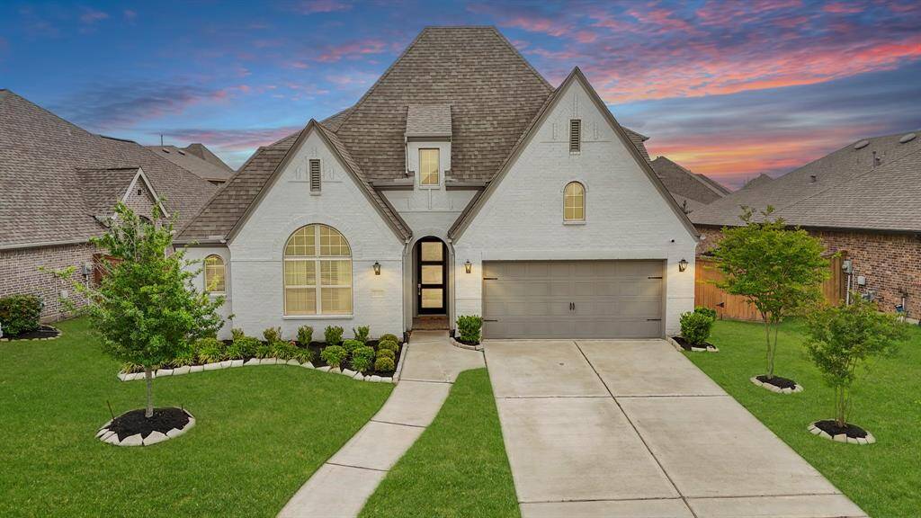 Located in the sought after master planned community of Elyson and zoned to the highly acclaimed Katy Independent School District sits 23206 Brookdale Bay Lane. Featuring a full brick exterior, this gorgeous home built by Highland Homes is within walking distance to McElwain Elementary School. The front of the home surrounded by professional landscaping with stone-lined flower beds is serviced by an automatic sprinkler system. Included is a rain gutter system with downspouts & gated access to the backyard.