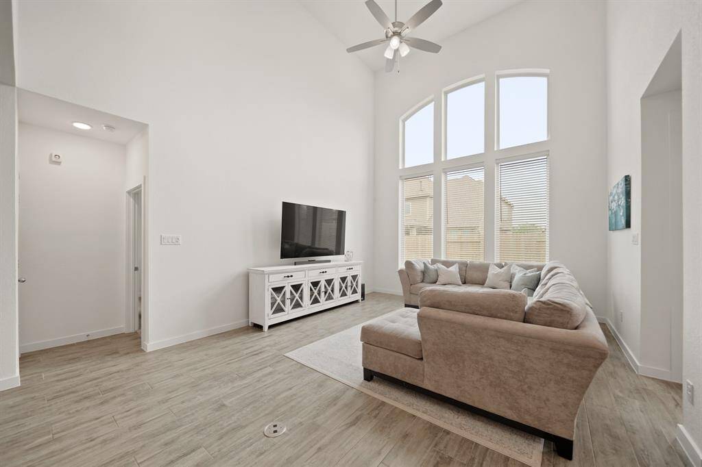 Additional features include pre-wiring for a wall mounted flat screen TV and a recessed floor plug. The owner's suite is accessible through the vestibule on the left.