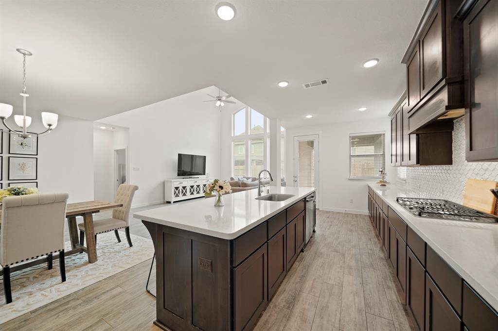 Imagine preparing your favorites meals & recipes in this thoughtfully planned kitchen while your guests mingle about the over-sized island and nearby living spaces.