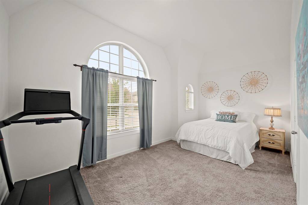 Unique to this floor plan is a secondary bedroom downstairs with access to a full bath.