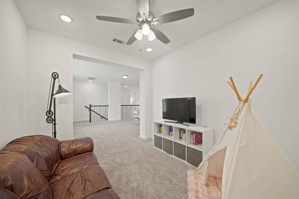 This flexible space could easily serve as a second floor living area, second study, gym, child's play space, etc.
