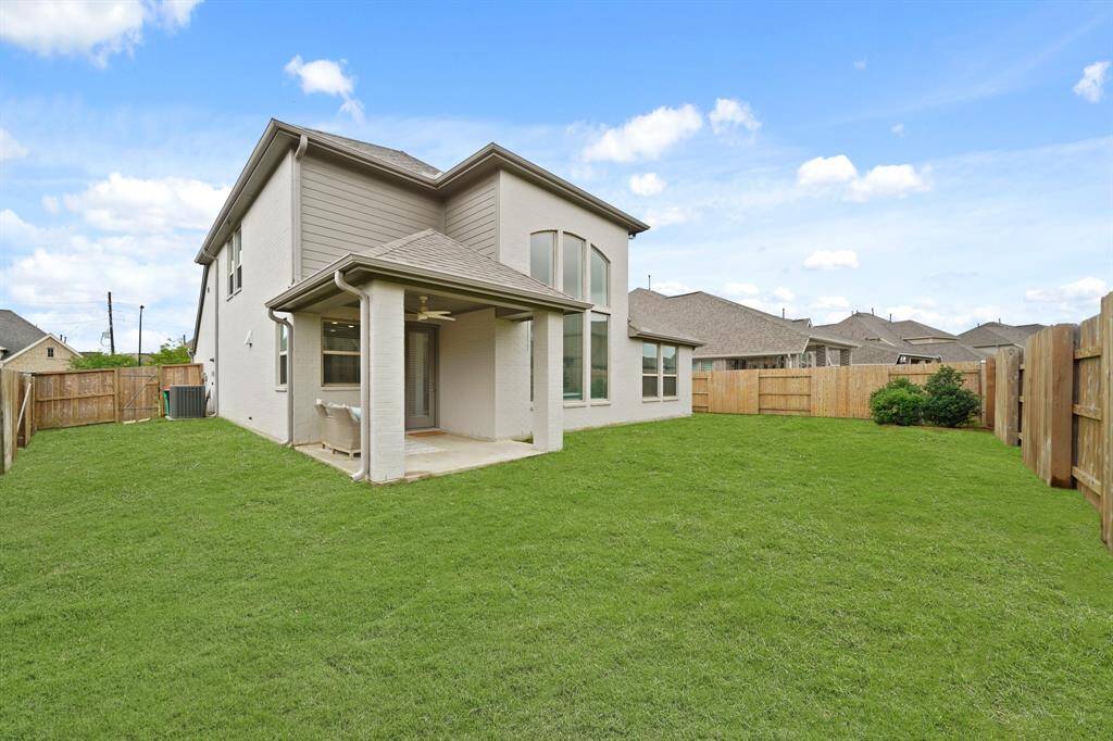 Included is gated access to the front of the home.