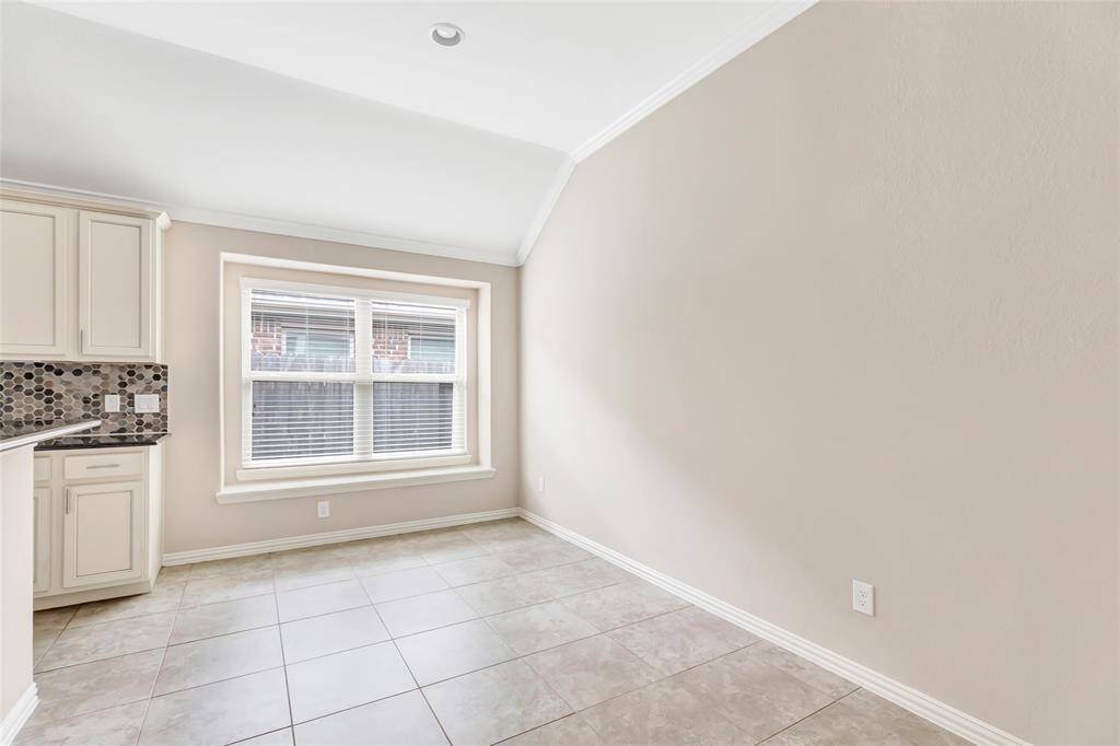 Dining room just off the kitchen and open to the family room