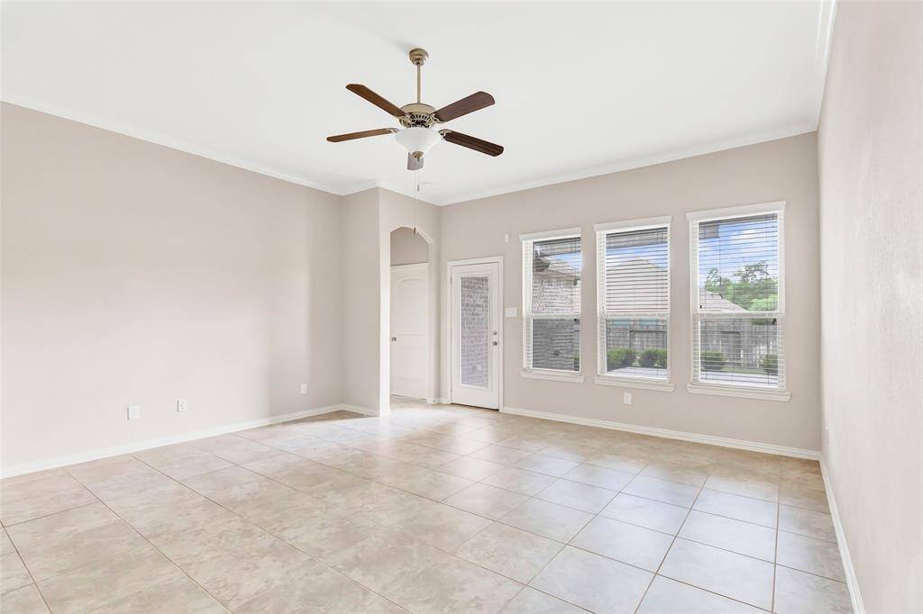 Family room. Owner's retreat is the door on the left which is the rear of the home.