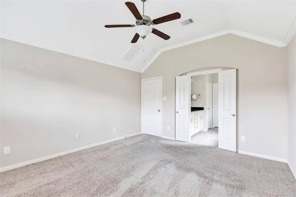 Owner's bedroom - rear of home. Split floor plan.