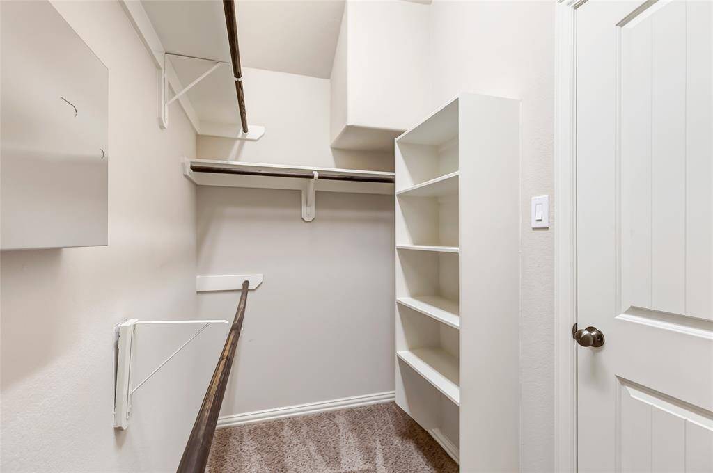Walk in closet for owner.
