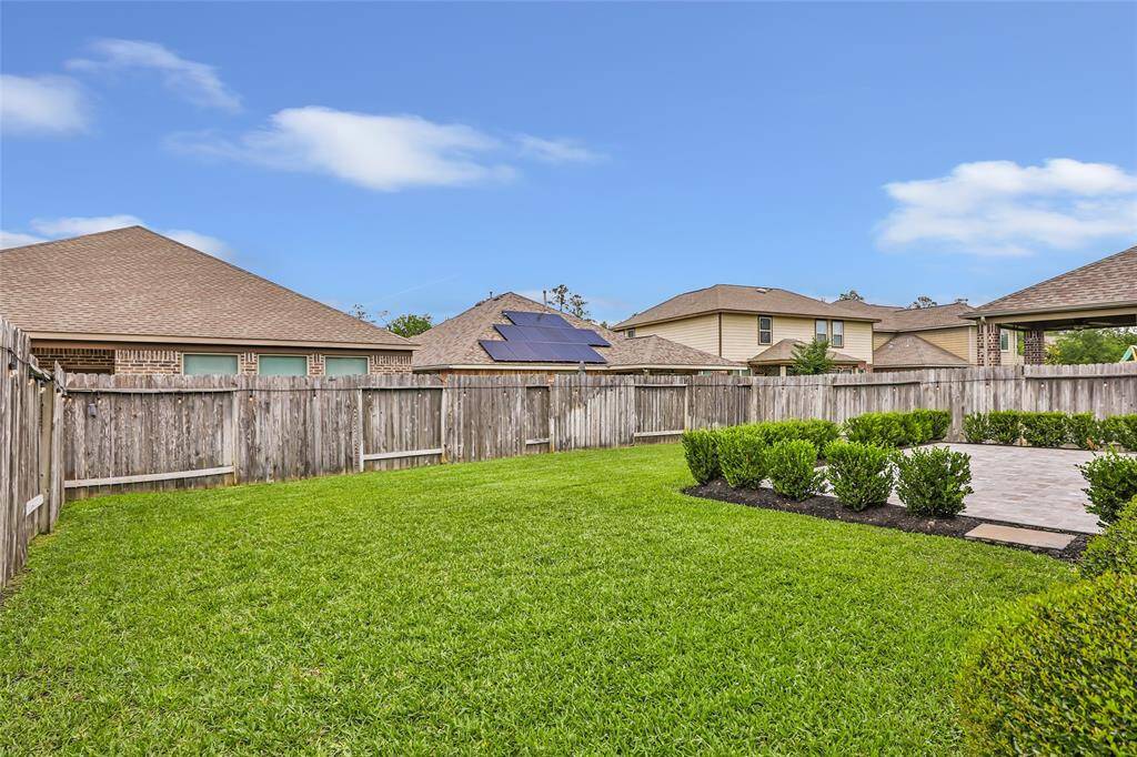 Plenty of green space for the kids or fur babies. Sprinkler system for entire front and back yard.
