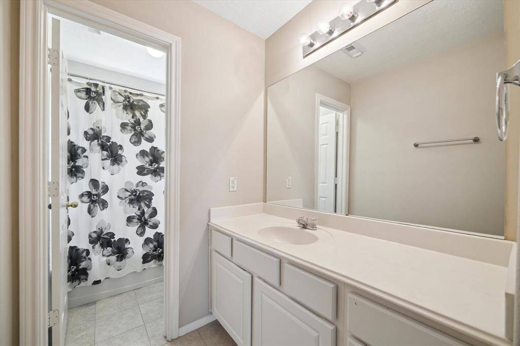 Spacious second-floor bathroom with modern amenities.