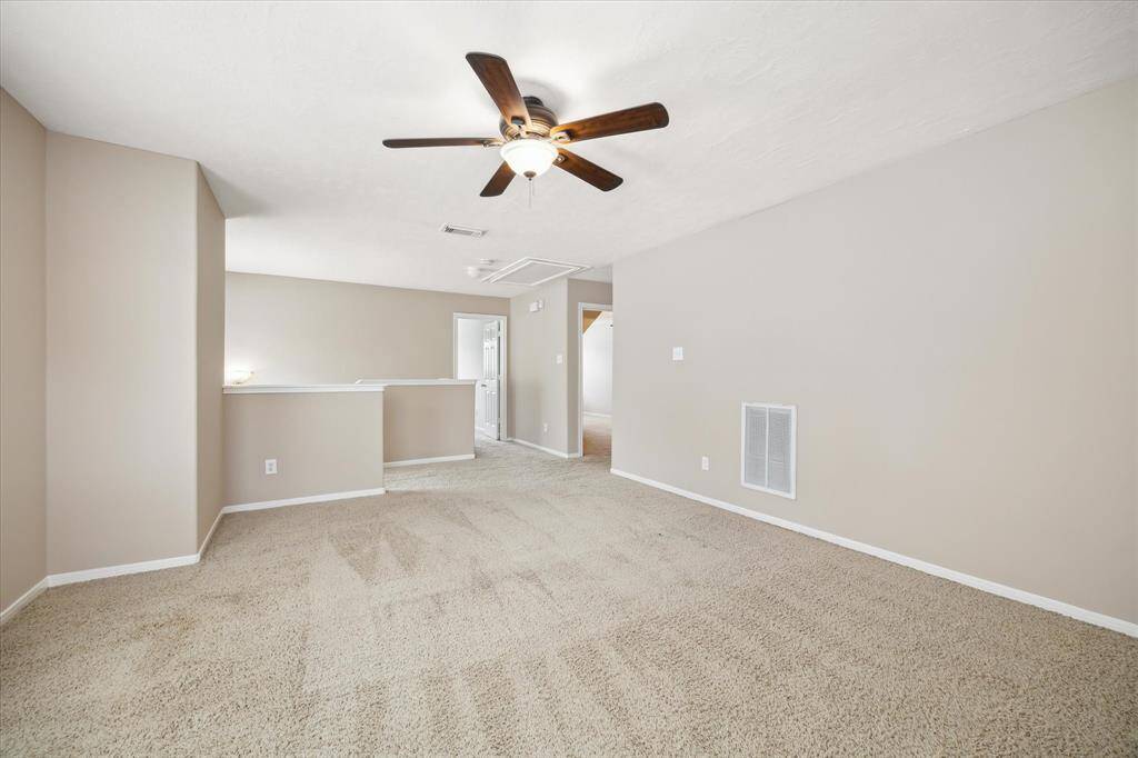 Upstairs open loft, ideal for entertaining.