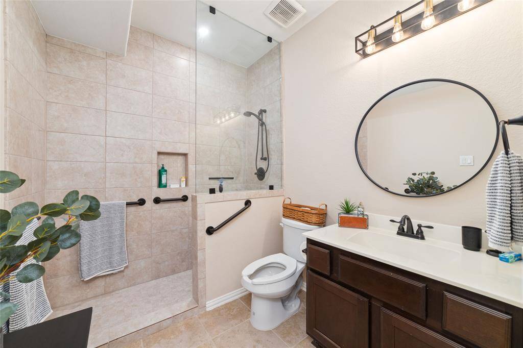 Bedroom 4 - This bedroom has been converted into an accessible guest suite with its own private bath—ideal for guests, extended family, or a double primary setup.