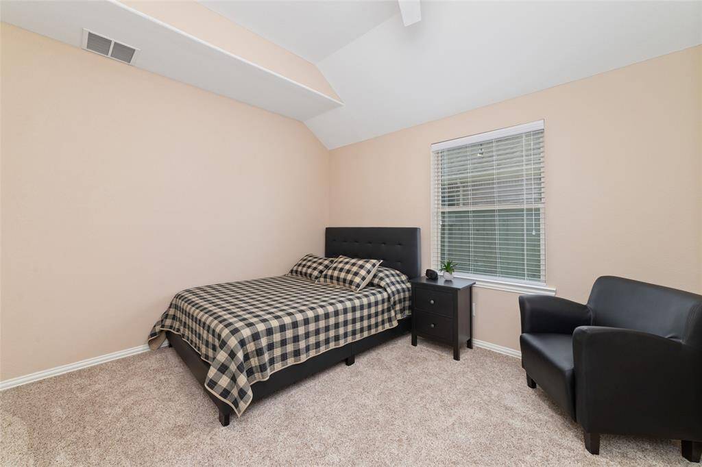 Bedroom 4 - This bedroom has been converted into an accessible guest suite with its own private bath—ideal for guests, extended family, or a double primary setup.