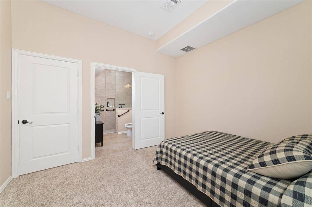 Bedroom 4 - This bedroom has been converted into an accessible guest suite with its own private bath—ideal for guests, extended family, or a double primary setup.