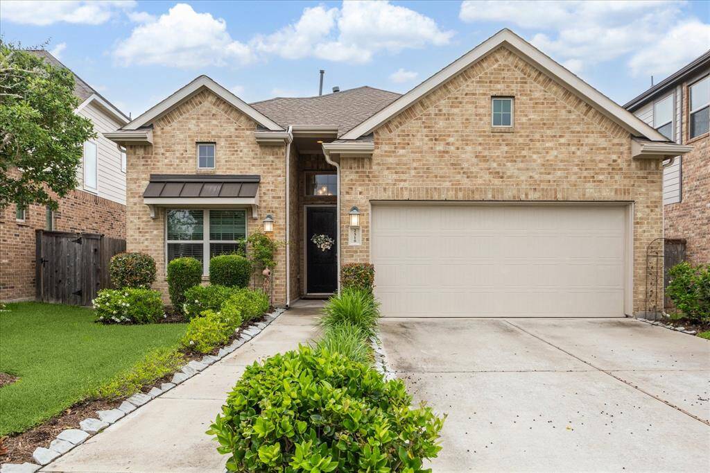 You'll enjoy ample off-street parking for you and your guests in the double-wide driveway and the two car garage.