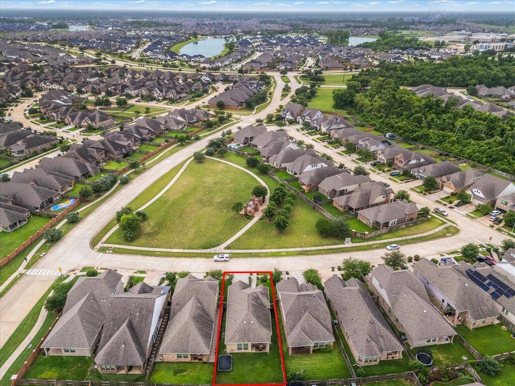 This home is located directly across from a big green space and park, creating a welcoming community atmosphere and lots of room for gathering with friends.