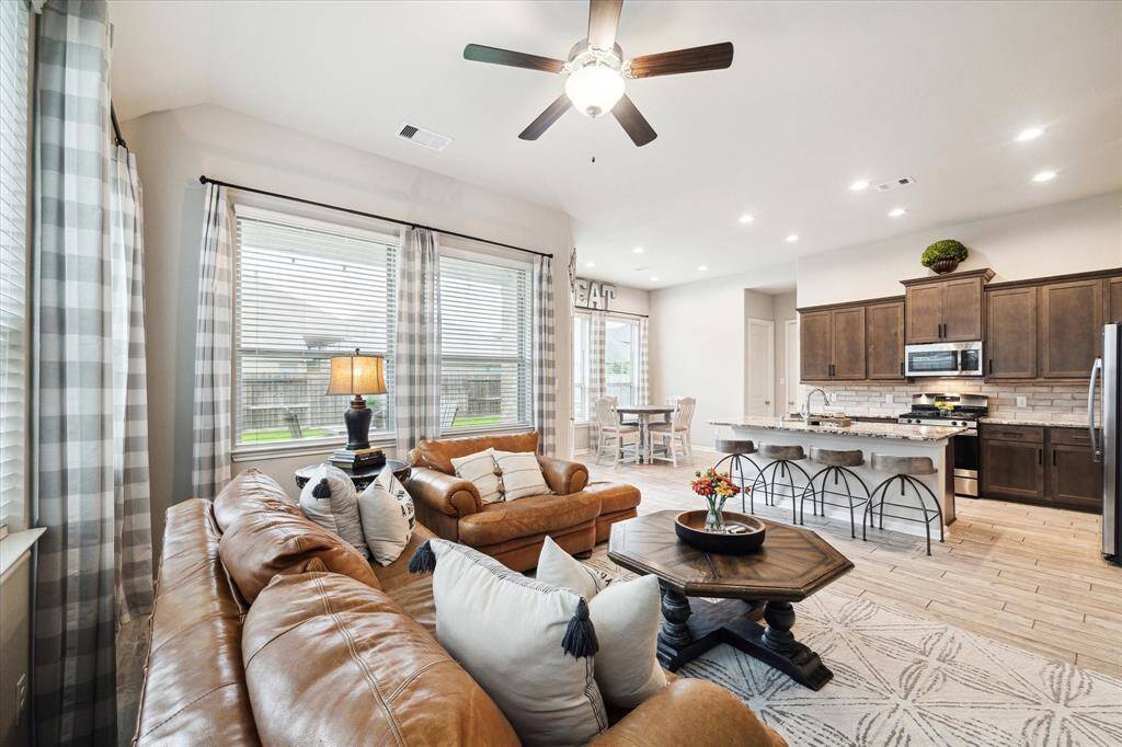 Another view of this living/kitchen open concept. It is the perfect space for family gatherings and entertaining.