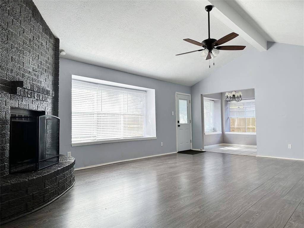 living room with high ceiling.
