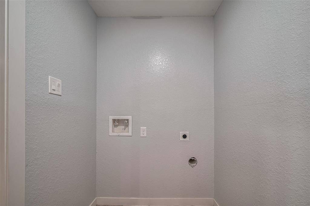 washer & dryer area has water and drain lines for future sink if neded.