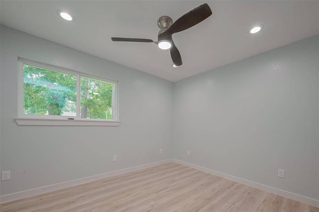 Bedroom with double sided strong windows.
