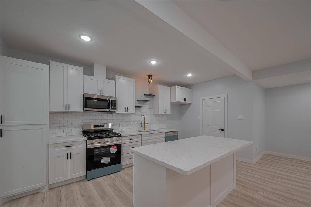 Ultra modern kitchen with brand new appliances.