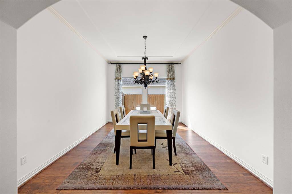 Enjoy your huge but private dining room boasting tray ceilings