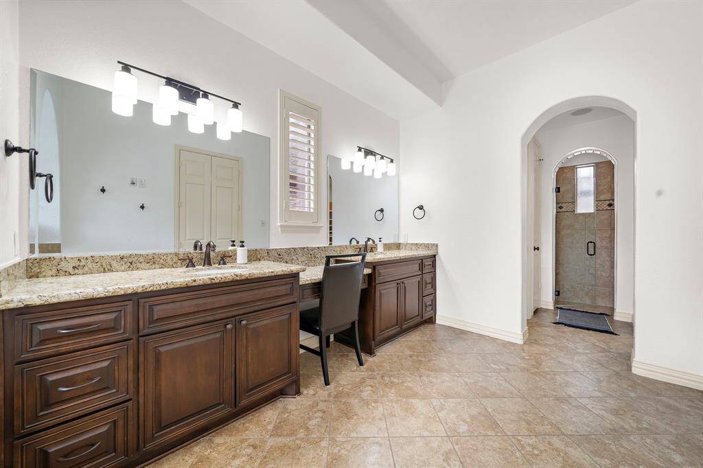 On the other side of the primary bathroom, you have the secluded toilet closet and a deceivingly large shower.