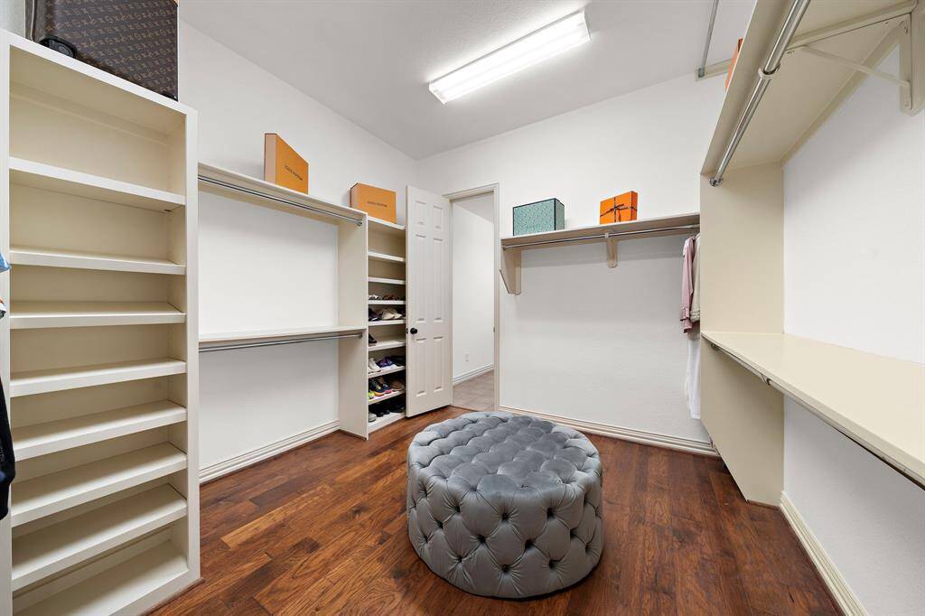 The primary closet has a convenient door that connects it directly to the laundry room.