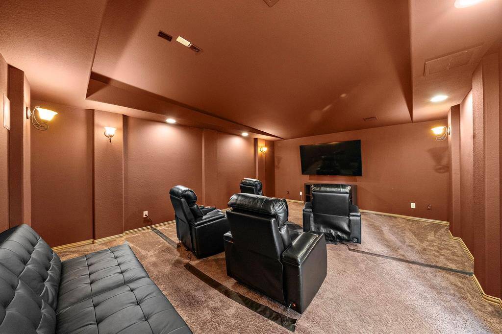 Fulfill a movie lovers dream in this spacious media room.