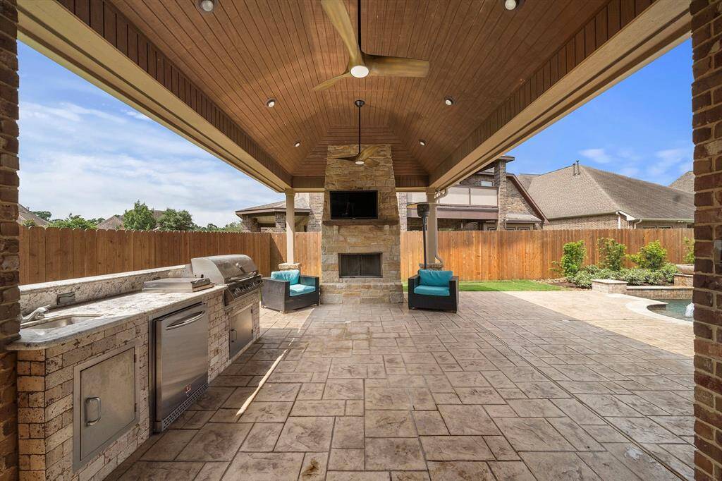 Rain or shine, enjoy the outdoor living areas this house offers