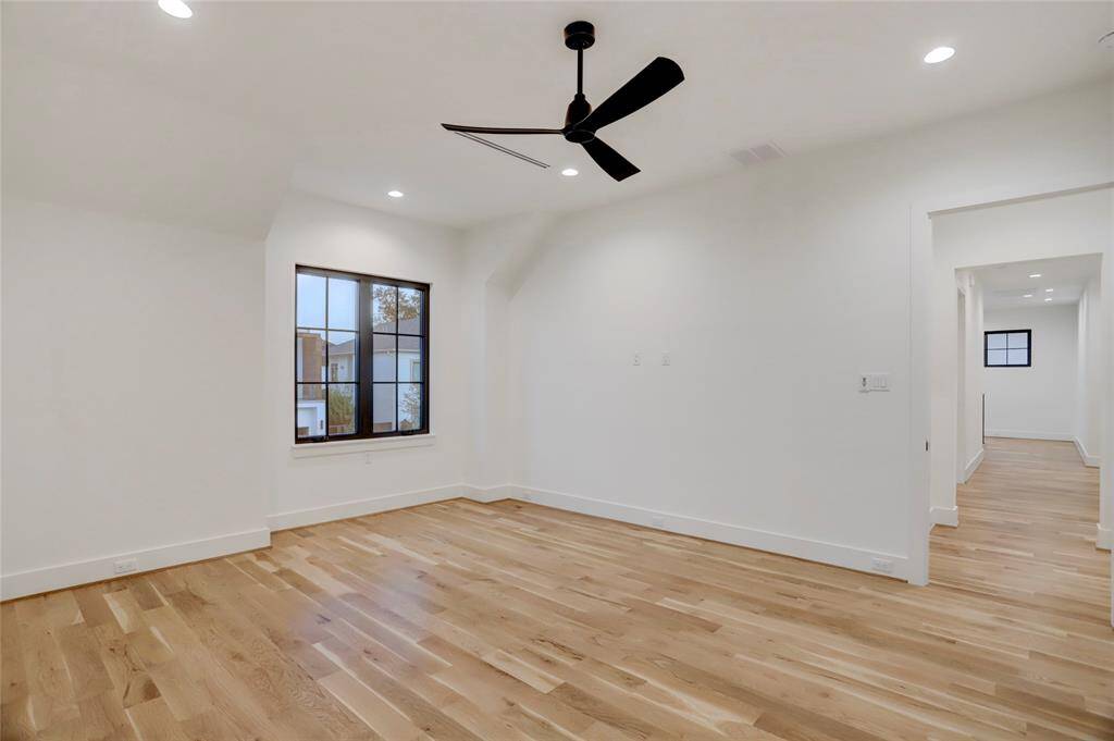 One of three secondary bedrooms on the second floor. All have ensuite bathrooms and walk-in closets.