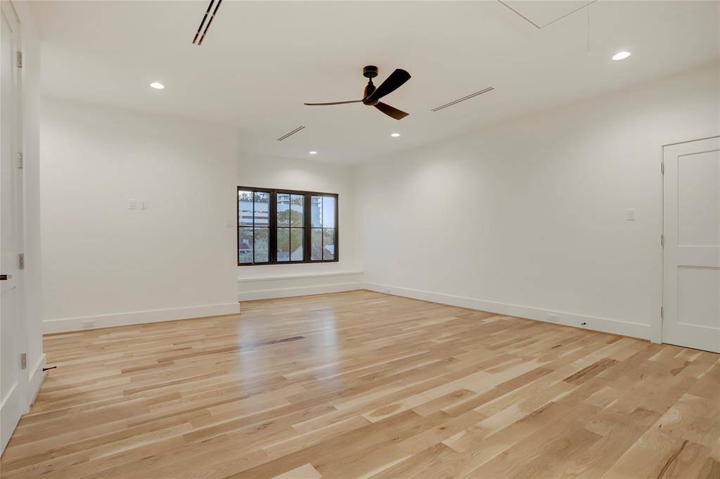 An additional and very spacious bedroom/flex room sits alone on the third floor. Also with elevator access, it could act as an in-law suite, private guest room, or hobby/work out room. This space includes a walk-in closet, attic access, and an ensuite bathroom.