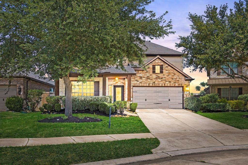 Freshly manicured landscape with an inviting front porch. Perfect for a couple of chairs to sit and enjoy your favorite beverage.