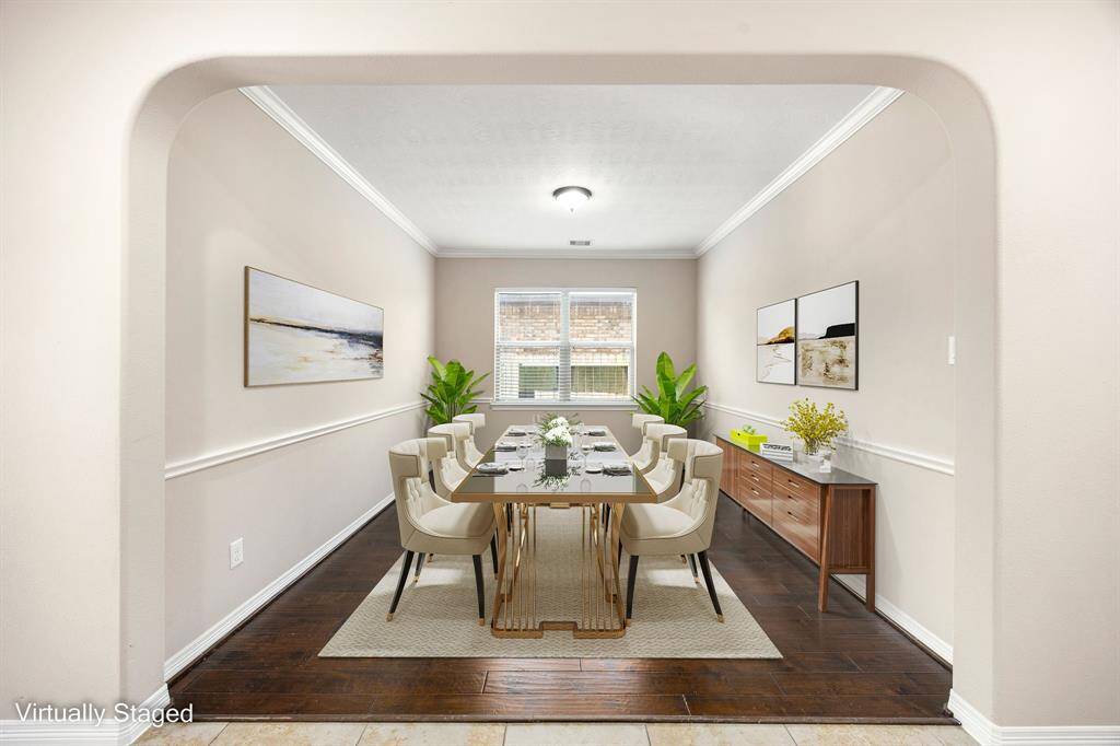 Virtually staged to show off its potential, this dining room is ready for everything from weeknight dinners to special celebrations.