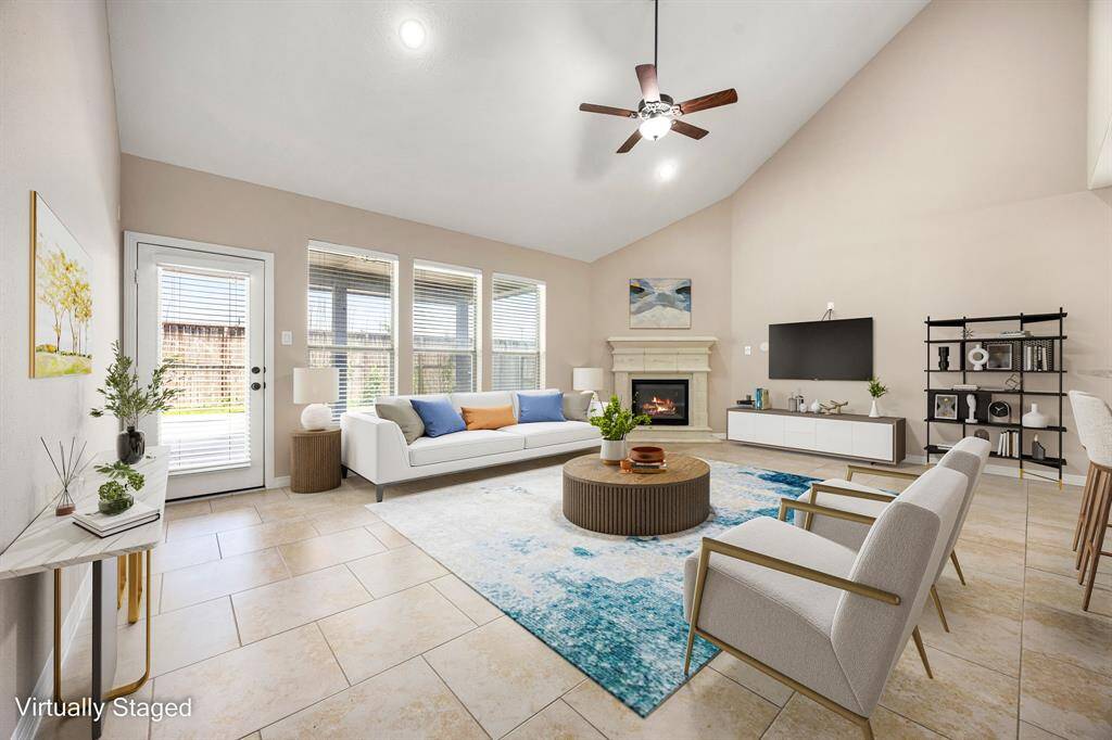 Beautifully virtually staged to highlight its charm, this living room blends comfort and style—helping you envision the perfect space to call home.