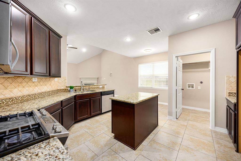 Notice the laundry room tucked away.