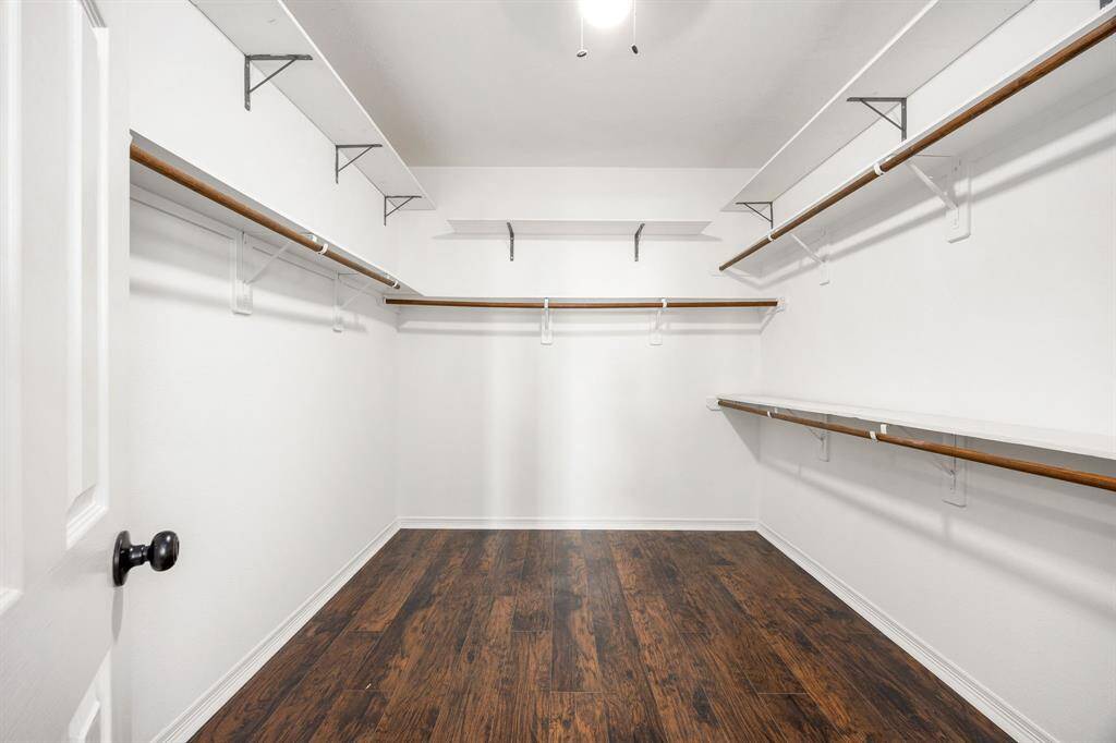 This primary closet will not disappoint you.