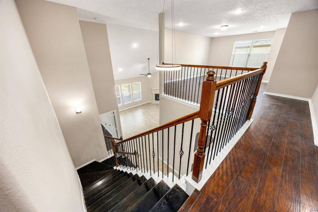 View of the upstairs landing and game room area.
