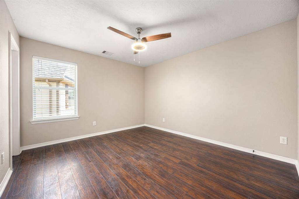 One of three secondary bedrooms upstairs.